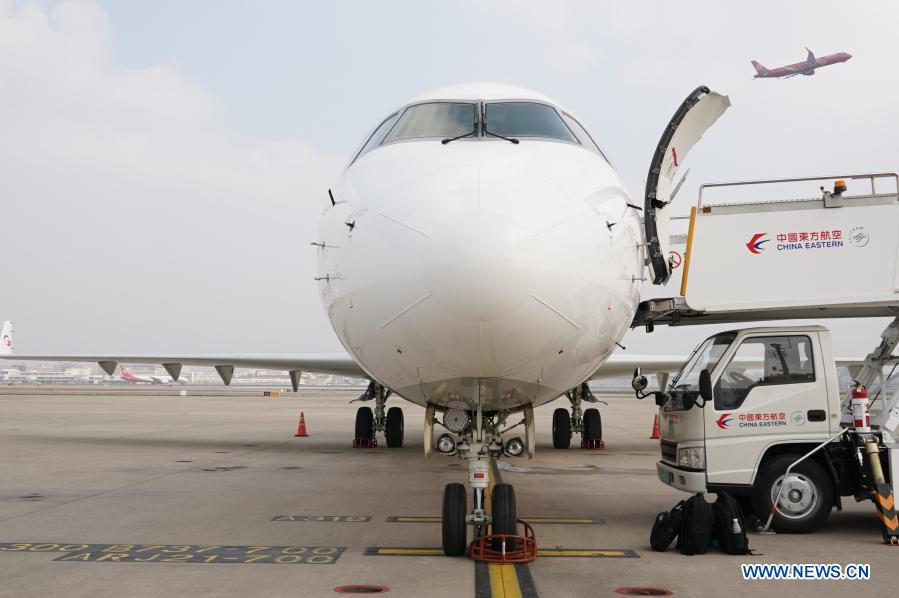 Photo taken on Dec. 28, 2020 shows an ARJ21 jetliner of One Two Three Airlines (OTT Airlines) before performing its first flight in Shanghai, east China. The ARJ21 is China's first turbo-fan regional passenger jetliner manufactured by the Commercial Aircraft Corporation of China (COMAC). OTT Airlines, a subsidiary of China Eastern Airlines, is the last among seven airlines to officially operate ARJ21 jetliner in China. (Xinhua/Ding Ting)