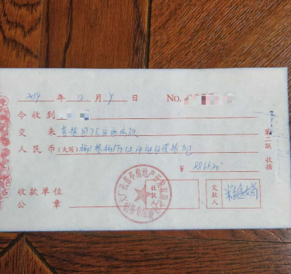 刘丽向记者提供了自己付清7号底商(所购7套底商中的一套)88万余元房款的收据。
