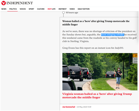 特朗普车队飞驰她竖起一根中指 被赞＂美国英雄