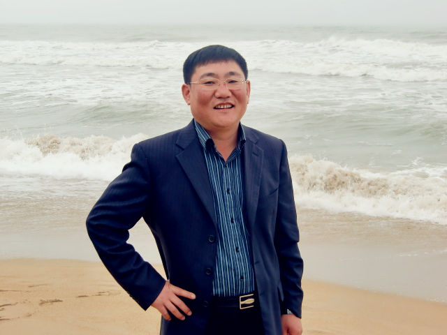 “西瓜大王”潘孝海。受访者供图