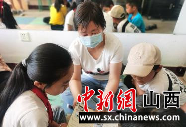 山西广灵县妇联开展“守护童年 牵手共成长”暑期儿童关爱服务活动