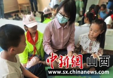 山西广灵县妇联开展“守护童年 牵手共成长”暑期儿童关爱服务活动