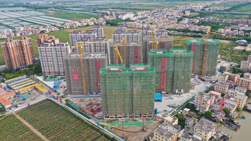 广州南沙万顷沙安置区一期项目全面封顶 将解决1632套居民安置房需求
