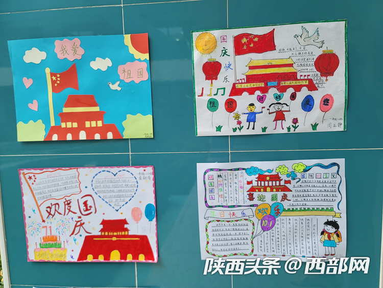 同学们精心制作国庆手抄报,绘画,剪纸等手工作品为国庆献礼.