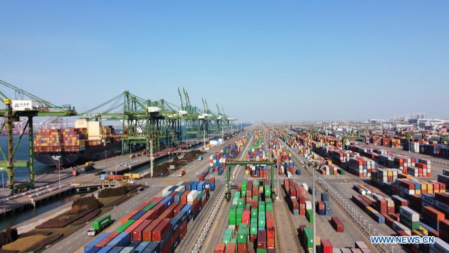 Aerial photo taken on Jan. 11, 2021 shows a view of the Pacific international container terminal at the Tianjin Port of north China's Tianjin Municipality. The Tianjin Port set a new record of 18.35 million twenty-foot equivalent units (TEU) for its container throughput in 2020, or a year-on-year growth of 6.1 percent. (Xinhua/Zhao Zishuo)