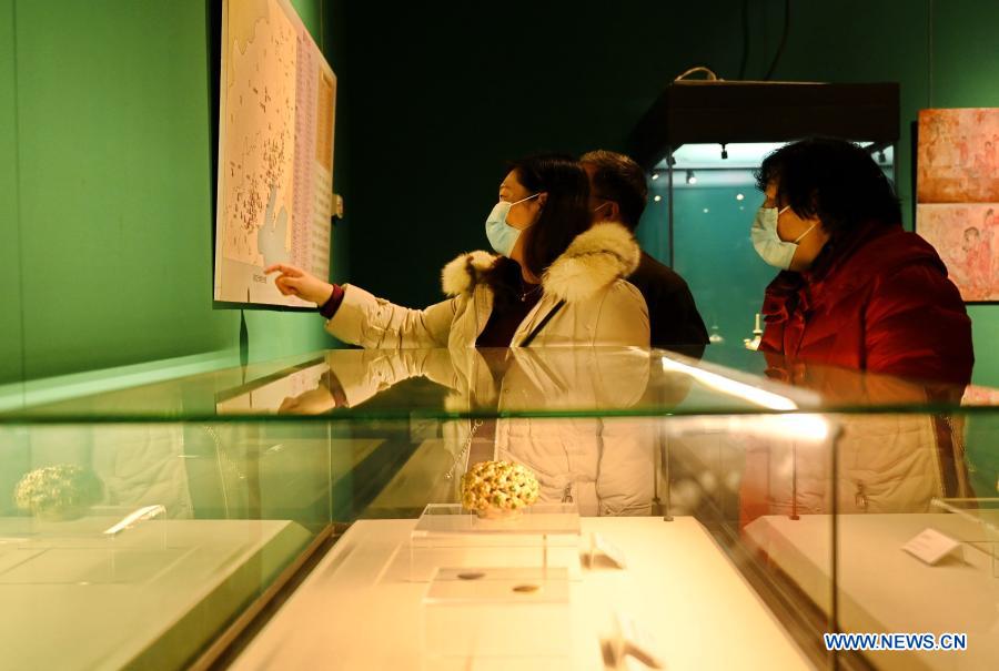 People visit an exhibition of cultural relics from ancient China's Liao Dynasty (907-1125) at Fujian Museum in Fuzhou City, southeast China's Fujian Province, Jan. 17, 2021. The exhibition, displaying a total of 120 precious treasures, lasts until March 28 and is free to the public. (Xinhua/Lin Shanchuan)