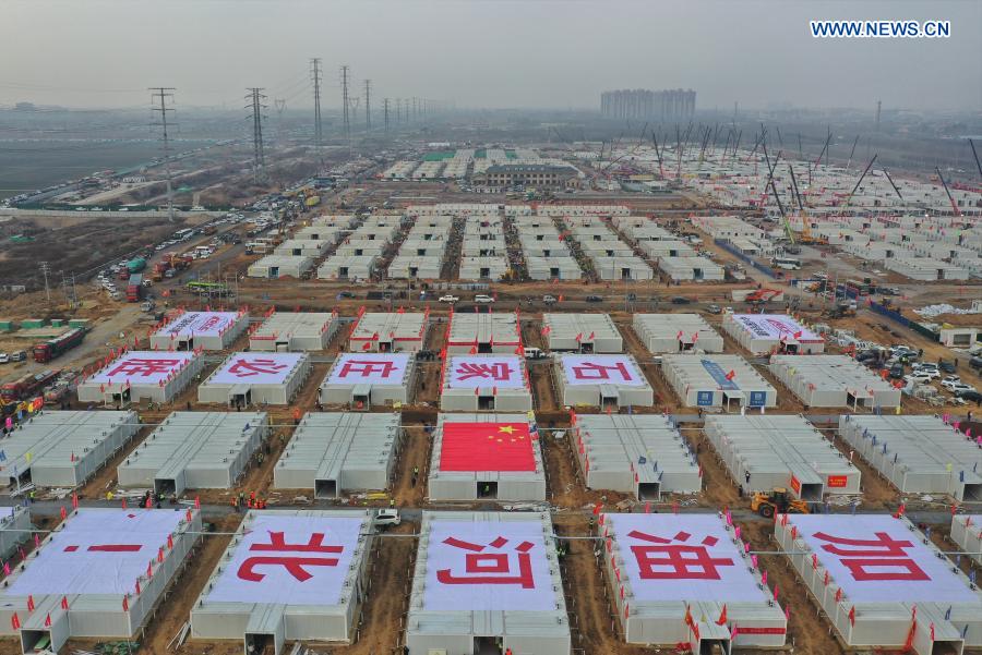 Aerial photo taken on Jan. 20, 2021 shows the construction site of the Huangzhuang Apartment quarantine center in Shijiazhuang, north China's Hebei Province. Located at the junction of Zhengding County and Gaocheng District in Shijiazhuang, the Huangzhuang Apartment COVID-19 quarantine center project has an area of 658 mu (about 43.87 hectares), and a capacity of 4,156 rooms, which is used to accommodate close contacts and sub-close contacts of confirmed COVID-19 patients. (Xinhua/Yang Shiyao)