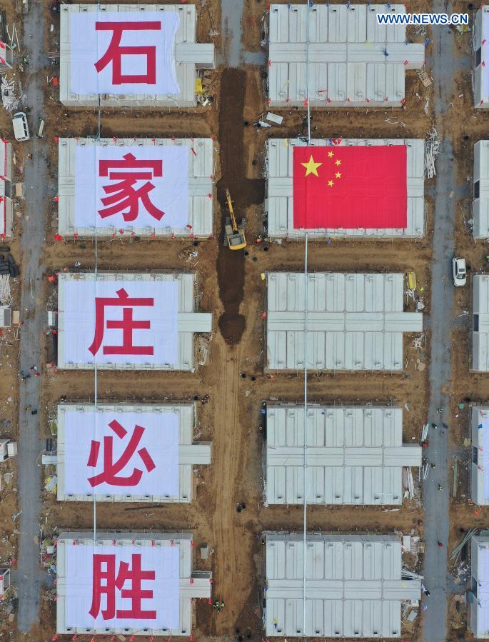 Aerial photo taken on Jan. 20, 2021 shows the construction site of the Huangzhuang Apartment quarantine center in Shijiazhuang, north China's Hebei Province. Located at the junction of Zhengding County and Gaocheng District in Shijiazhuang, the Huangzhuang Apartment COVID-19 quarantine center project has an area of 658 mu (about 43.87 hectares), and a capacity of 4,156 rooms, which is used to accommodate close contacts and sub-close contacts of confirmed COVID-19 patients. (Xinhua/Yang Shiyao)