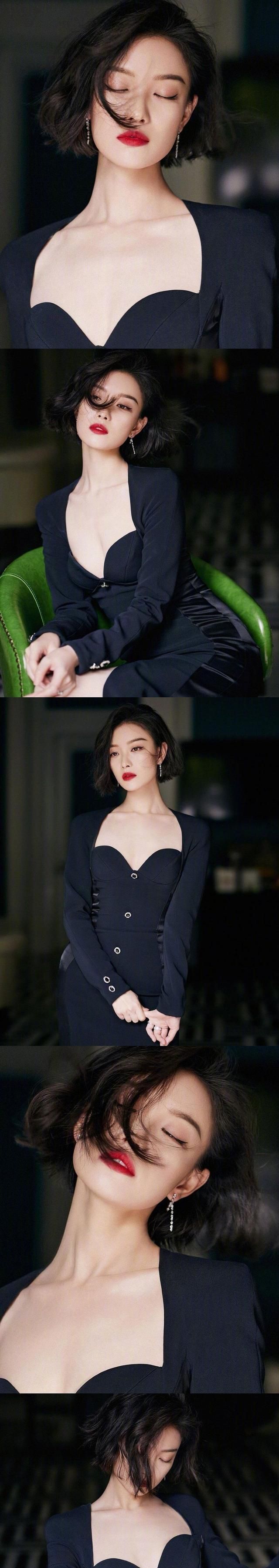 短发的倪妮看起来干练又性感,这个造型有复古的感觉,很像画中的女郎