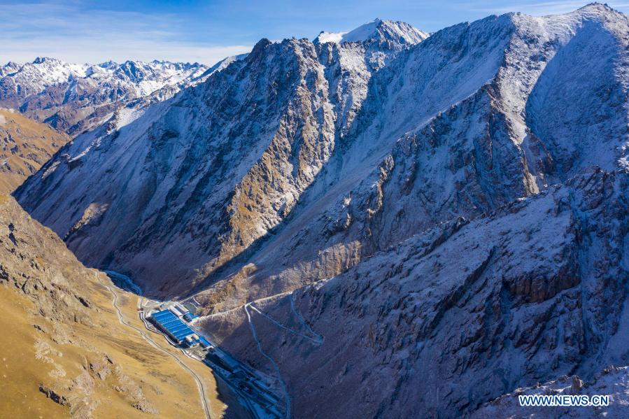 Aerial photo taken on Feb. 4, 2021 shows the construction site of the entrance section of Tianshan Shengli tunnel in northwest China's Xinjiang Uygur Autonomous Region. Tianshan Shengli tunnel, with a total length of about 22 kilometers, is currently the longest highway tunnel under construction in China. Started in 2020, the tunnel, a six-year project on the Urumqi-Yuli highway, passes through a cold and high altitude zone, with harsh climate and geological condition. After completion and opened to traffic, it will provide safer and more convenient travel to the passengers and promote local economic and social development. (Xinhua/Hu Huhu)