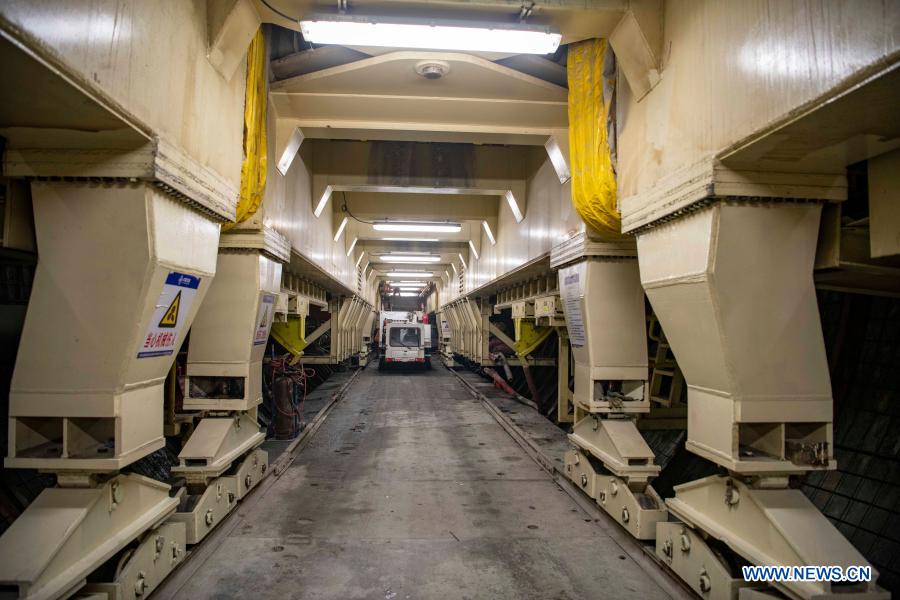 Photo taken on Feb. 4, 2021 shows the construction site of Tianshan Shengli tunnel in northwest China's Xinjiang Uygur Autonomous Region. Tianshan Shengli tunnel, with a total length of about 22 kilometers, is currently the longest highway tunnel under construction in China. Started in 2020, the tunnel, a six-year project on the Urumqi-Yuli highway, passes through a cold and high altitude zone, with harsh climate and geological condition. After completion and opened to traffic, it will provide safer and more convenient travel to the passengers and promote local economic and social development. (Xinhua/Hu Huhu)