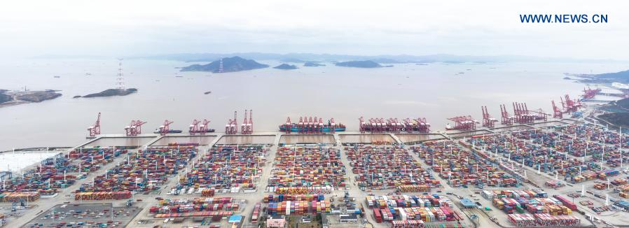 Aerial photo taken on March 3, 2021 shows a view at the Ningbo Zhoushan Port in Ningbo, east China's Zhejiang Province. Both cargo and container throughput of Ningbo Zhoushan Port registered year-on-year growth of 4.7 percent and 4.3 percent respectively in 2020. The port saw its cargo throughput reach 1.172 billion tons while the container throughput achieved 28.72 million twenty-foot equivalent units (TEUs) last year. (Xinhua/Weng Xinyang)