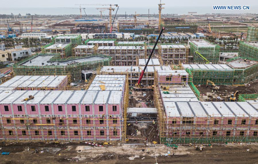 Aerial photo taken on March 3, 2021 shows the construction site of an enterprise port project in Jiangdong New Area of Haikou, south China's Hainan Province. The project is designed as a low-density and garden-style office park. (Xinhua/Pu Xiaoxu)