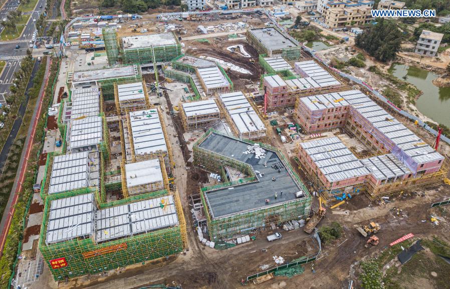 Aerial photo taken on March 3, 2021 shows the construction site of an enterprise port project in Jiangdong New Area of Haikou, south China's Hainan Province. The project is designed as a low-density and garden-style office park. (Xinhua/Pu Xiaoxu)