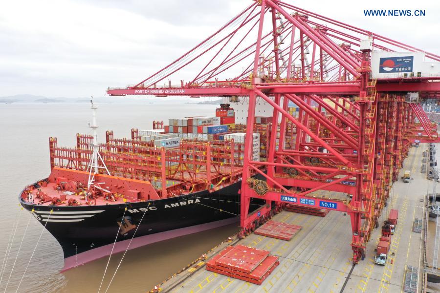 Aerial photo taken on March 3, 2021 shows a view of the Ningbo Zhoushan Port in Ningbo, east China's Zhejiang Province. Both cargo and container throughput of Ningbo Zhoushan Port registered year-on-year growth of 4.7 percent and 4.3 percent respectively in 2020. The port saw its cargo throughput reach 1.172 billion tons while the container throughput achieved 28.72 million twenty-foot equivalent units (TEUs) last year. (Xinhua/Weng Xinyang)