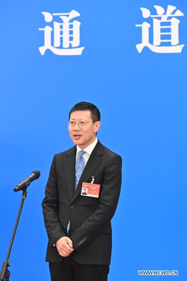 Shen Nanpeng, a member of the 13th National Committee of the Chinese People's Political Consultative Conference (CPPCC), gives an interview via video link ahead of the second plenary meeting of the fourth session of the 13th CPPCC National Committee at the Great Hall of the People in Beijing, capital of China, March 7, 2021. (Xinhua/Zhang Haofu)