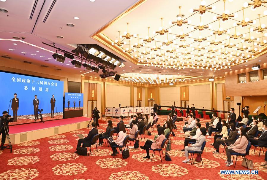 Journalists are seen during an interview via video link at the Media Center Hotel in Beijing, capital of China, March 7, 2021. Members of the 13th National Committee of the Chinese People's Political Consultative Conference (CPPCC) took questions via video link at the Great Hall of the People in Beijing ahead of the second plenary meeting of the fourth session of the 13th CPPCC National Committee on Sunday. (Xinhua/He Changshan)