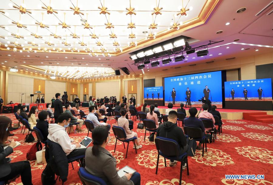 Journalists are seen during an interview via video link at the Media Center Hotel in Beijing, capital of China, March 7, 2021. Members of the 13th National Committee of the Chinese People's Political Consultative Conference (CPPCC) took questions via video link at the Great Hall of the People in Beijing ahead of the second plenary meeting of the fourth session of the 13th CPPCC National Committee on Sunday. (Xinhua/Wang Nan)