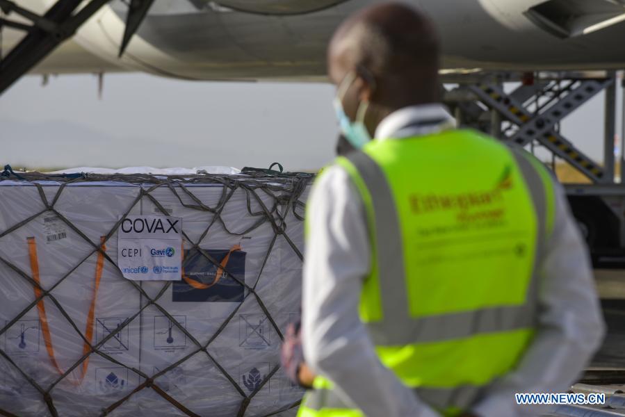 The COVID-19 vaccines from COVAX arrive at Bole international airport in Addis Ababa, Ethiopia, March 7, 2021. Ethiopia on Sunday received its first 2.2 million COVID-19 vaccines from COVAX, crucial in the east African country's fight to stop the spread of the pandemic. (Photo by Michael Tewelde/Xinhua)