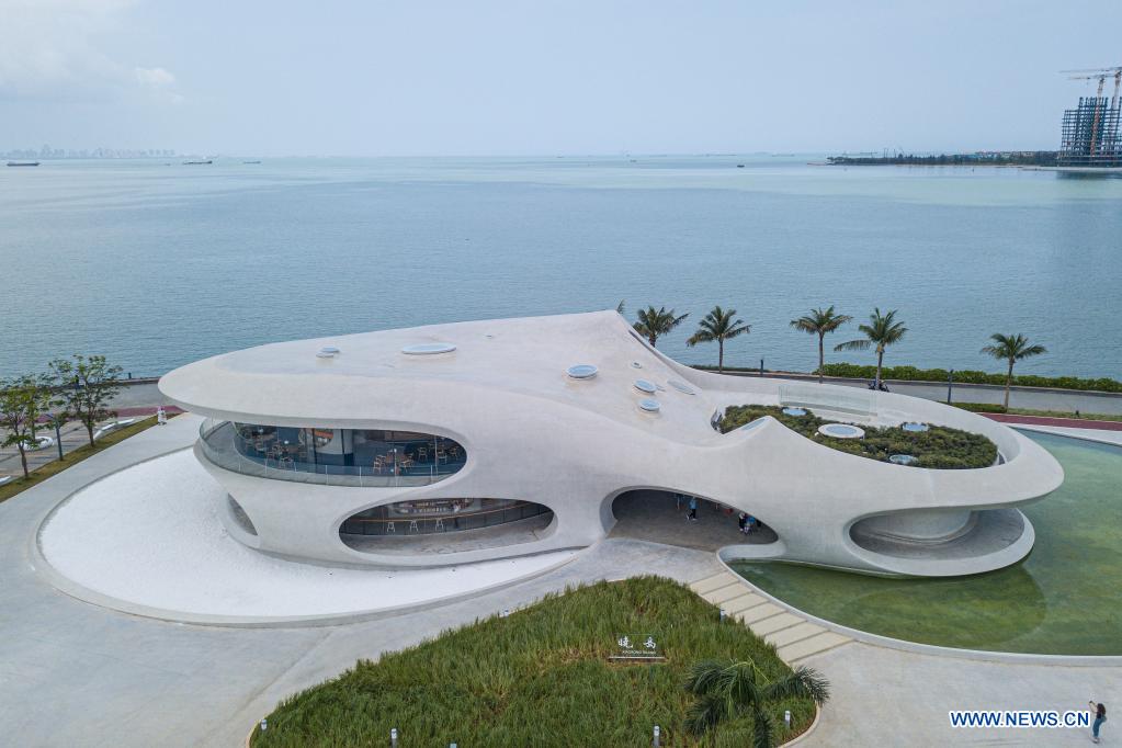 Aerial photo taken on April 13, 2021 shows the Wormhole Library in the Haikou Bay in Haikou, capital city of south China's Hainan Province. The Wormhole Library, designed as a landmark building in the Haikou Bay, opened to public on Tuesday. (Xinhua/Pu Xiaoxu)