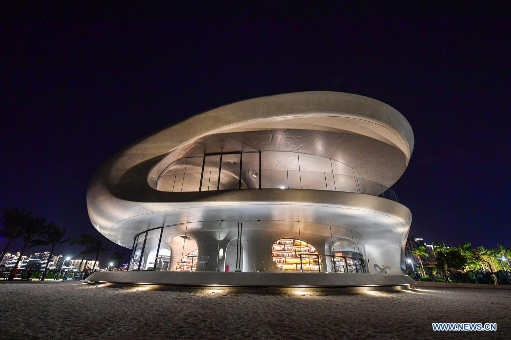 Photo taken on April 12, 2021 shows the Wormhole Library in the Haikou Bay in Haikou, capital city of south China's Hainan Province. The Wormhole Library, designed as a landmark building in the Haikou Bay, opened to public on Tuesday. (Xinhua/Pu Xiaoxu)