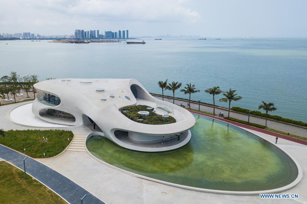 Aerial photo taken on April 13, 2021 shows the Wormhole Library in the Haikou Bay in Haikou, capital city of south China's Hainan Province. The Wormhole Library, designed as a landmark building in the Haikou Bay, opened to public on Tuesday. (Xinhua/Pu Xiaoxu)