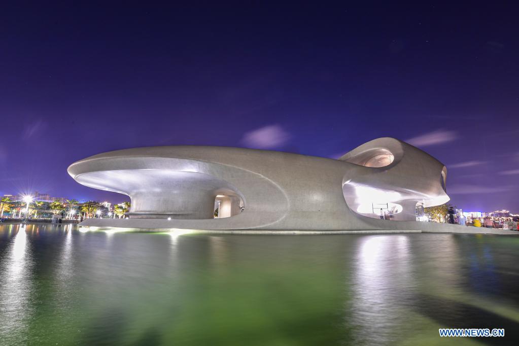 Photo taken on April 12, 2021 shows the Wormhole Library in the Haikou Bay in Haikou, capital city of south China's Hainan Province. The Wormhole Library, designed as a landmark building in the Haikou Bay, opened to public on Tuesday. (Xinhua/Pu Xiaoxu)