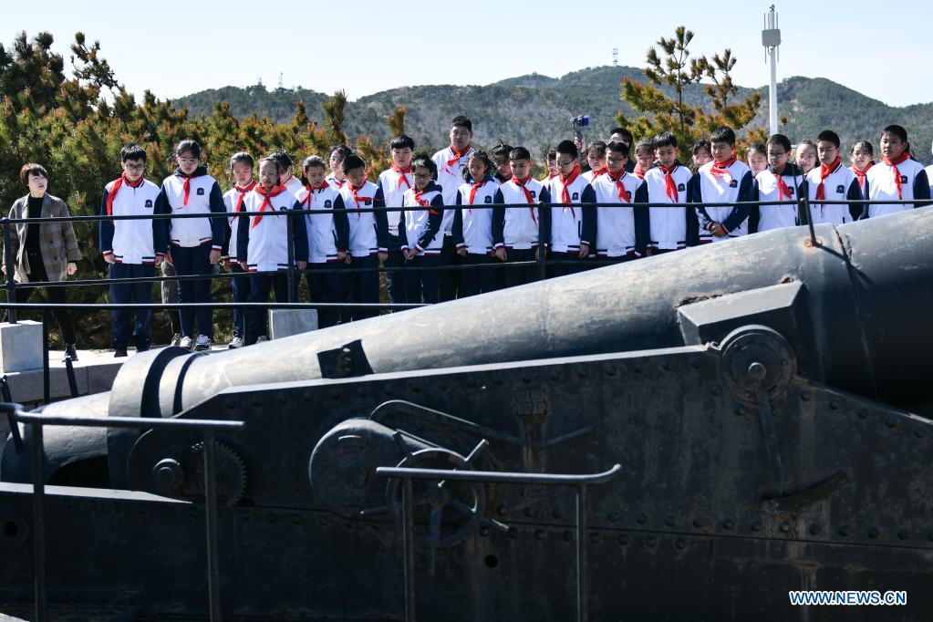 Students visit a fort relic site in an education and training base on Liugong Island in the city of Weihai, east China's Shandong Province, April 13, 2021. Primary and secondary school students take part in educational activities ahead of the National Security Education Day that falls on April 15. (Xinhua/Zhu Zheng)