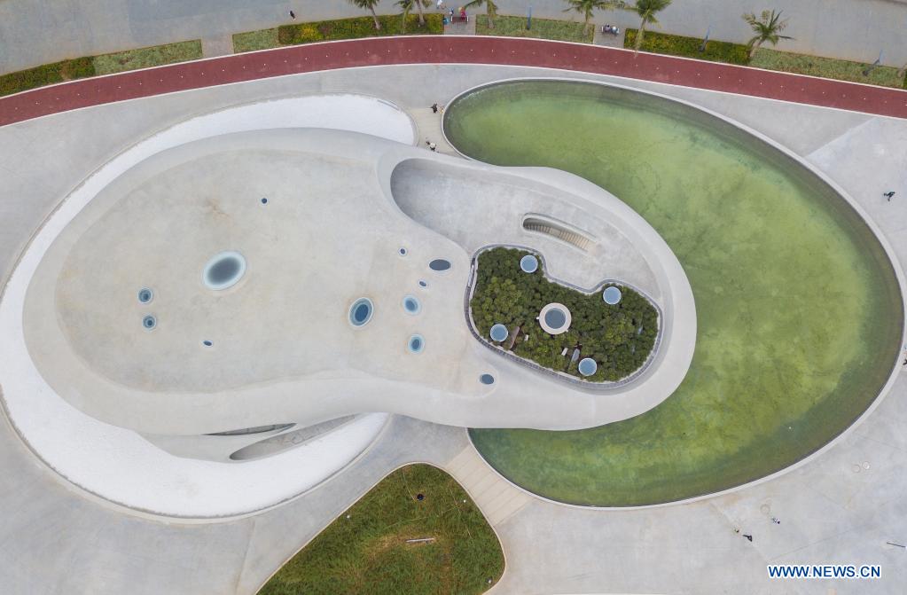 Aerial photo taken on April 13, 2021 shows the Wormhole Library in the Haikou Bay in Haikou, capital city of south China's Hainan Province. The Wormhole Library, designed as a landmark building in the Haikou Bay, opened to public on Tuesday. (Xinhua/Pu Xiaoxu)