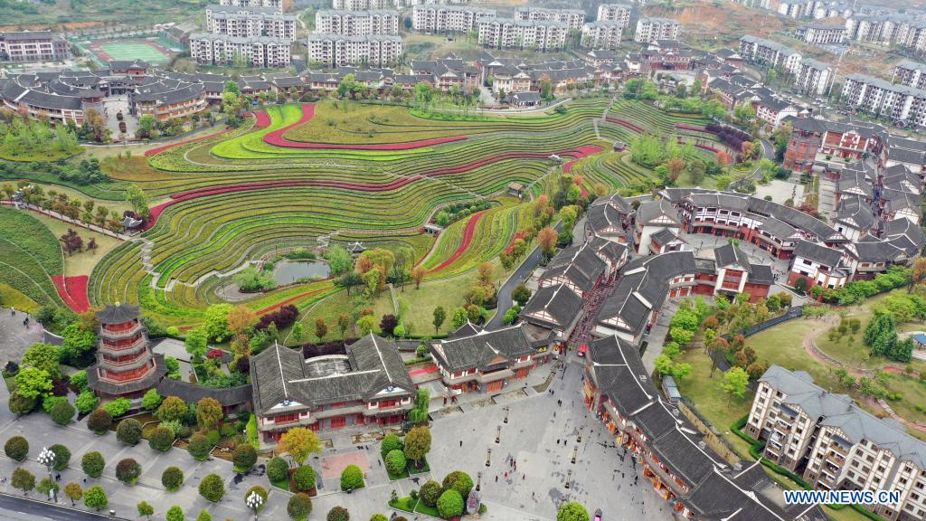 Aerial photo taken on April 14, 2021 shows the spring scenery of terraced fields in Shexiang ancient town in Dafang County of Bijie, southwest China's Guizhou Province. (Xinhua/Yang Ying)