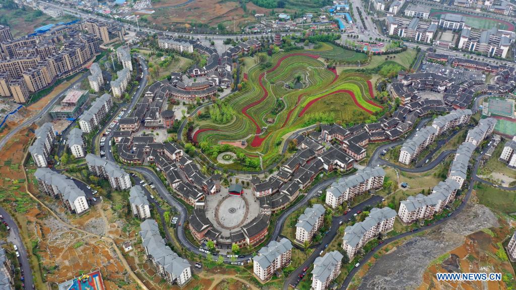 Aerial photo taken on April 14, 2021 shows the spring scenery of terraced fields in Shexiang ancient town in Dafang County of Bijie, southwest China's Guizhou Province. (Xinhua/Yang Ying)