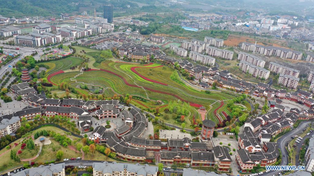 Aerial photo taken on April 14, 2021 shows the spring scenery of terraced fields in Shexiang ancient town in Dafang County of Bijie, southwest China's Guizhou Province. (Xinhua/Yang Ying)