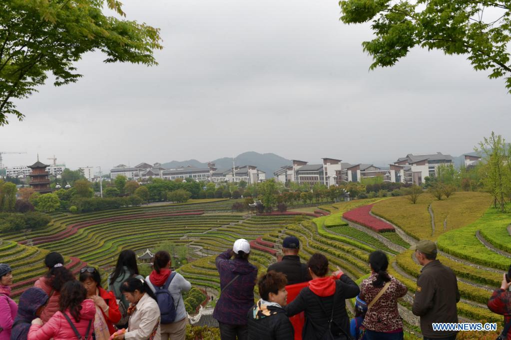 Tourists visit terraced fields in Shexiang ancient town in Dafang County of Bijie, southwest China's Guizhou Province, April 14, 2021. (Xinhua/Yang Ying)