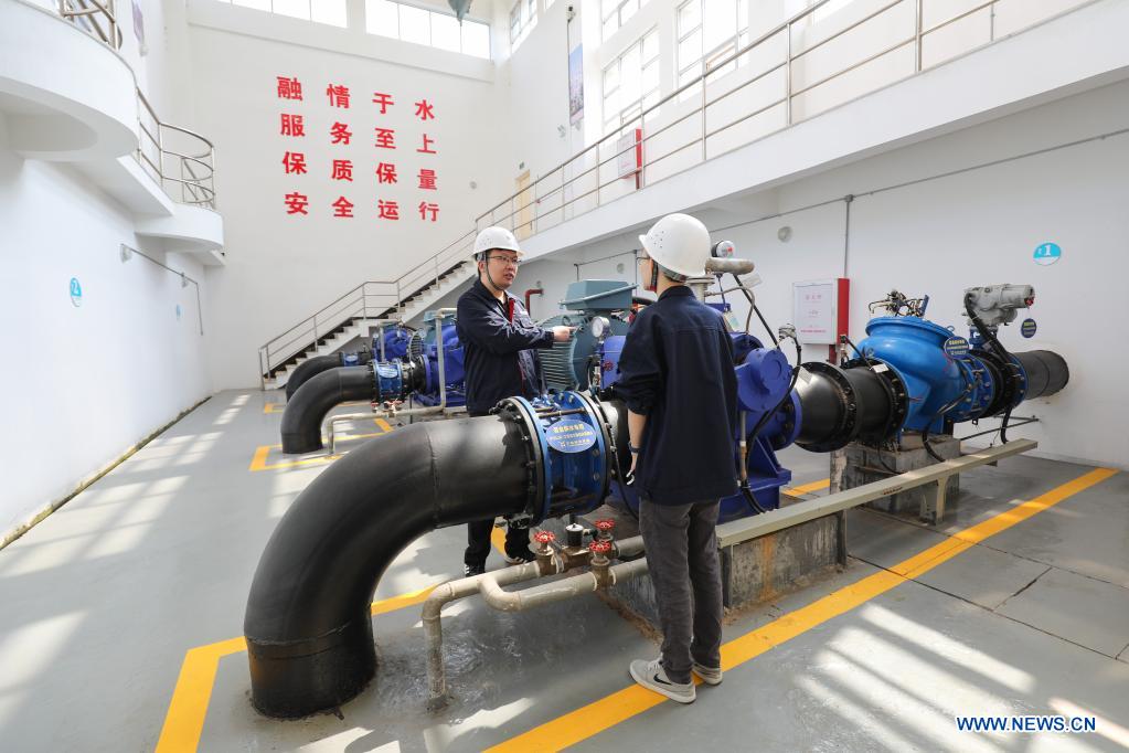 Staff check on the pump condition at the water-diversion project connecting Fujian Province to the island of Kinmen in Jinjiang, southeast China's Fujian Province. The water pipeline connecting Fujian to Kinmen went into operation in 2018, delivering water from Fujian's Jinjiang River to alleviate water shortages. (Photo by Lai Jincai/Xinhua)