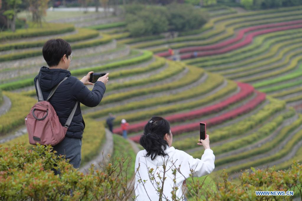 Tourists visit terraced fields in Shexiang ancient town in Dafang County of Bijie, southwest China's Guizhou Province, April 14, 2021. (Xinhua/Yang Ying)