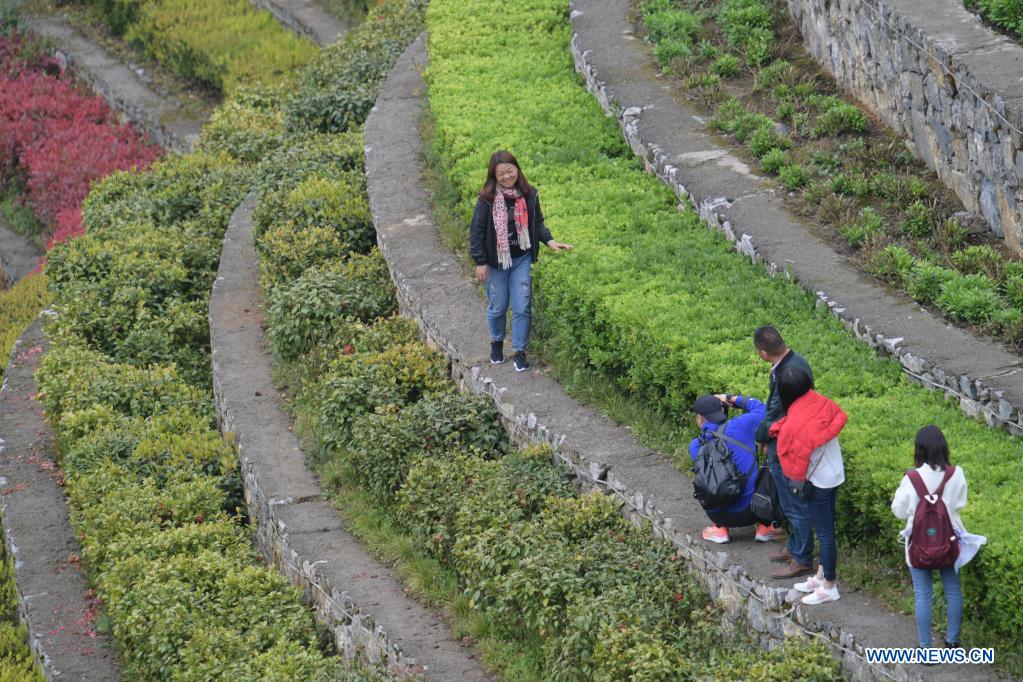 Tourists visit terraced fields in Shexiang ancient town in Dafang County of Bijie, southwest China's Guizhou Province, April 14, 2021. (Xinhua/Yang Ying)