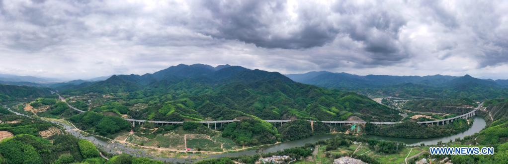 Aerial photo taken on March 26, 2021 shows a panoramic view of expressways in south China's Hainan Province. Hainan has made significant progress in the construction of expressway since the 13th Five-Year Plan, which started in 2016. By far, the total mileage of expressways in the province has reached 1,255 kilometers. The transport upgrade will help boost the building of Hainan into an international tourism and consumption center. (Xinhua/Guo Cheng)