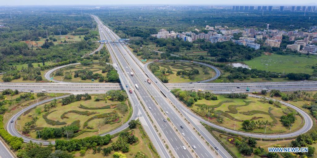 Aerial photo taken on April 15, 2021 shows a view of expressways in south China's Hainan Province. Hainan has made significant progress in the construction of expressway since the 13th Five-Year Plan, which started in 2016. By far, the total mileage of expressways in the province has reached 1,255 kilometers. The transport upgrade will help boost the building of Hainan into an international tourism and consumption center. (Xinhua/Guo Cheng)