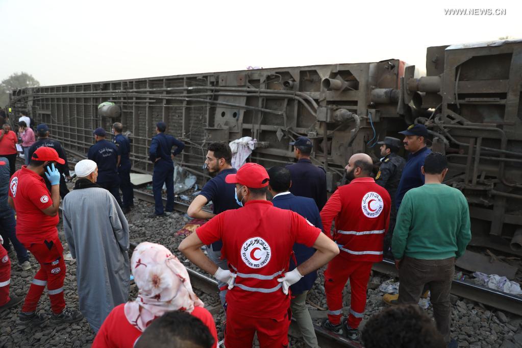 Rescuers work at the site of a train derailment in the Delta city of Toukh, Egypt, on April 18, 2021. At least 97 people were wounded in a train derailment on Sunday in the Delta city of Toukh, north of the Egyptian capital Cairo, the Egyptian Health Ministry said. (Xinhua/Ahmed Gomaa)