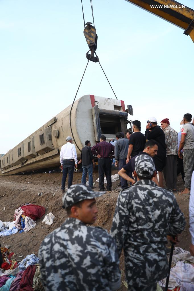 Rescuers work at the site of a train derailment in the Delta city of Toukh, Egypt, on April 18, 2021. At least 97 people were wounded in a train derailment on Sunday in the Delta city of Toukh, north of the Egyptian capital Cairo, the Egyptian Health Ministry said. (Xinhua/Ahmed Gomaa)