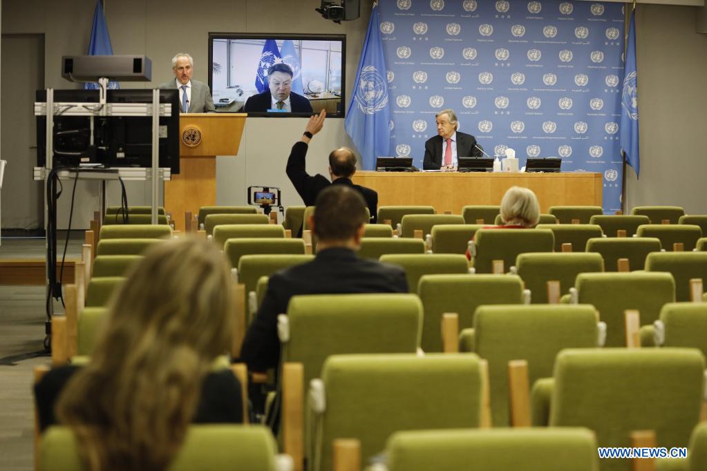 UN Secretary-General Antonio Guterres (Rear, R) attends the joint hybrid press conference with Secretary-General of the World Meteorological Organization Petteri Taalas (on the screen) to launch the State of the Global Climate in 2020 Report at the UN headquarters in New York, on April 19, 2021. Guterres on Monday called for specific commitments and real action to fight climate change after speaking out about the severity of the climatic disruptions that have raged the planet. (Xinhua/Xie E)