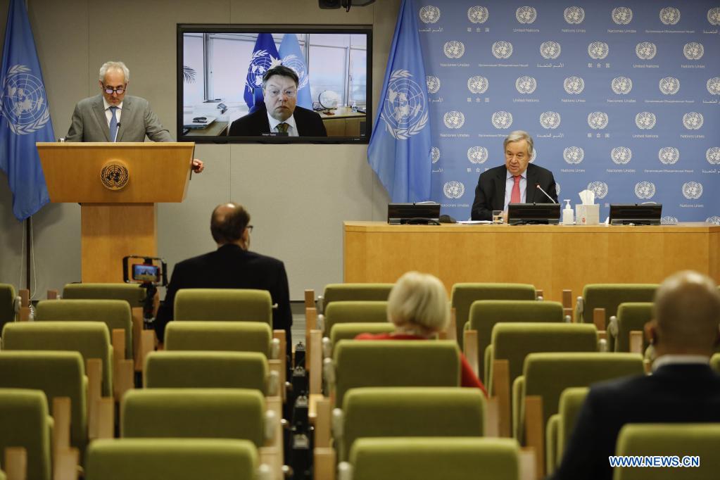 UN Secretary-General Antonio Guterres (Rear, R) attends the joint hybrid press conference with Secretary-General of the World Meteorological Organization Petteri Taalas (on the screen) to launch the State of the Global Climate in 2020 Report at the UN headquarters in New York, on April 19, 2021. Guterres on Monday called for specific commitments and real action to fight climate change after speaking out about the severity of the climatic disruptions that have raged the planet. (Xinhua/Xie E)