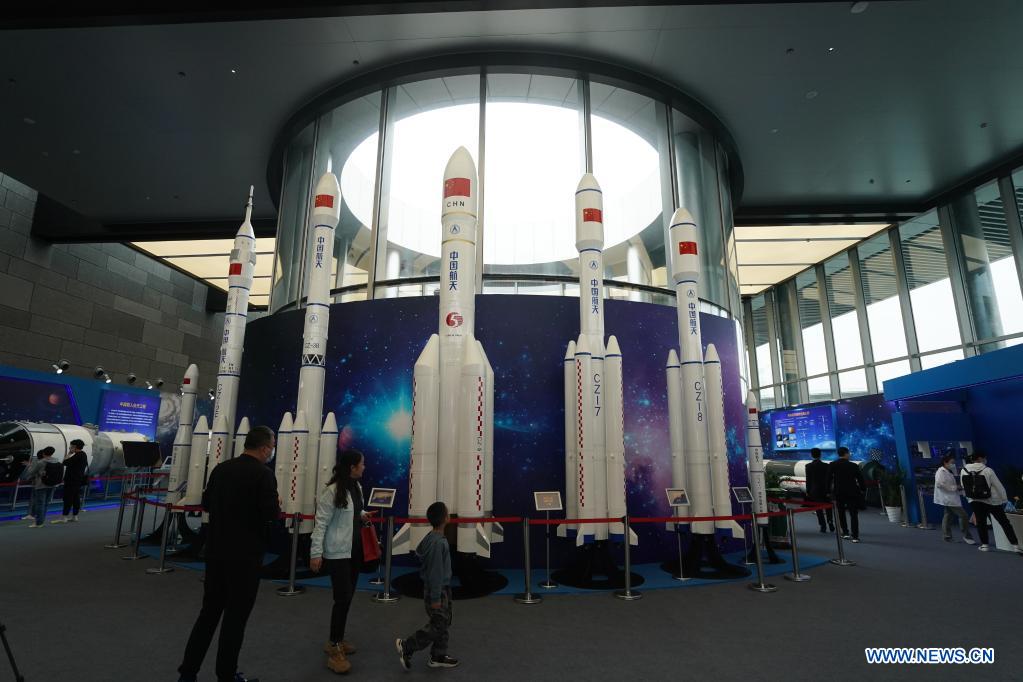 People visit an exhibition featuring space science and achievement during the 2021 China Space Conference in Nanjing, east China's Jiangsu Province, April 24, 2021. The 2021 China Space Conference is held in Nanjing from April 23 to 26. (Xinhua/Ji Chunpeng)