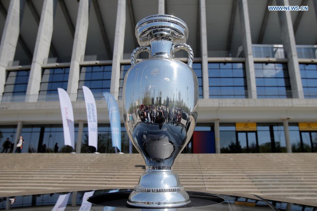 The EURO 2020 soccer tournament trophy is seen during a presentation in Bucharest, Romania, April 25, 2021. The EURO 2020 soccer tournament was postponed to 2021 due to COVID-19 pandemic. Bucharest will host three matches of Group C and one from the round of 16 at the National Arena. (Photo by Cristian Cristel/Xinhua)