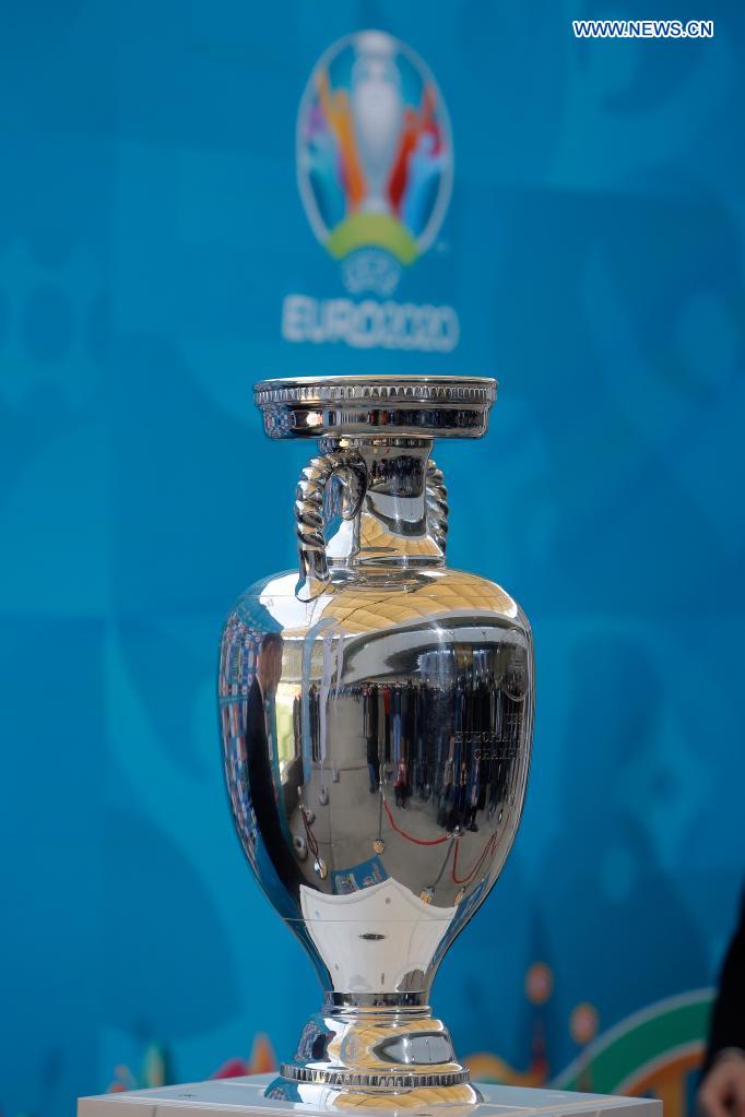 The EURO 2020 soccer tournament trophy is seen during a presentation in Bucharest, Romania, April 25, 2021. The EURO 2020 soccer tournament was postponed to 2021 due to COVID-19 pandemic. Bucharest will host three matches of Group C and one from the round of 16 at the National Arena. (Photo by Cristian Cristel/Xinhua)