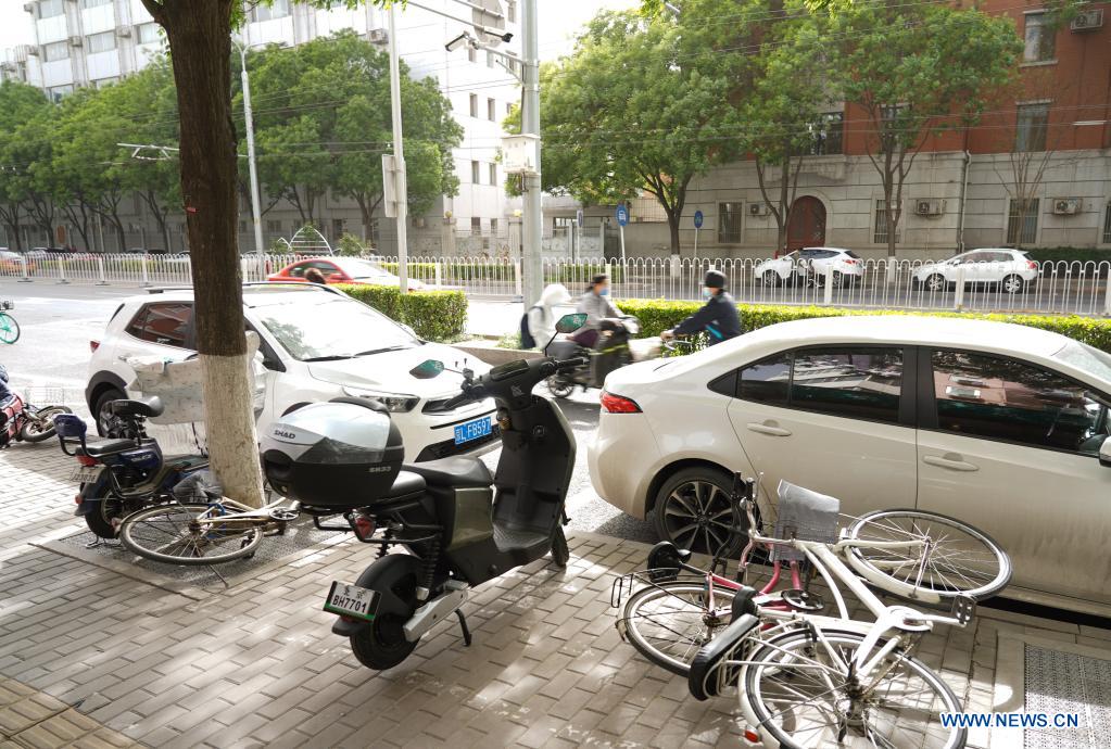 Bikes are blown over by wind in Beijing, capital of China, May 6, 2021. Floating sand and dust affected Beijing from Thursday noon time. (Xinhua/Chen Zhonghao)