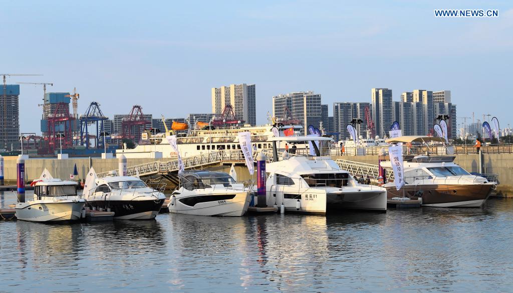 Yachts are displayed at a yacht show during the first China International Consumer Products Expo in Haikou, capital of south China's Hainan Province, May 7, 2021. The yacht show, part of the first China International Consumer Products Expo, opened on Friday at the Haikou National Sailing Base Public Wharf in Haikou, featuring a total of 107 yachts in 58 brands. The expo kicked off here on Thursday. (Xinhua/Yang Guanyu)