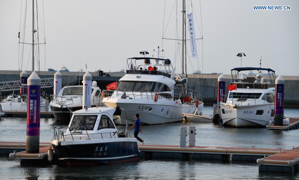 Yachts are displayed at a yacht show during the first China International Consumer Products Expo in Haikou, capital of south China's Hainan Province, May 7, 2021. The yacht show, part of the first China International Consumer Products Expo, opened on Friday at the Haikou National Sailing Base Public Wharf in Haikou, featuring a total of 107 yachts in 58 brands. The expo kicked off here on Thursday. (Xinhua/Yang Guanyu)