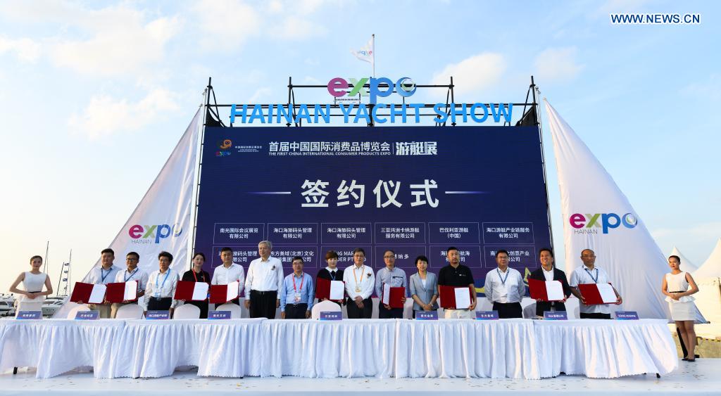 Guests take part in the opening ceremony of a yacht show during the first China International Consumer Products Expo in Haikou, capital of south China's Hainan Province, May 7, 2021. The yacht show, part of the first China International Consumer Products Expo, opened on Friday at the Haikou National Sailing Base Public Wharf in Haikou, featuring a total of 107 yachts in 58 brands. The expo kicked off here on Thursday. (Xinhua/Yang Guanyu)