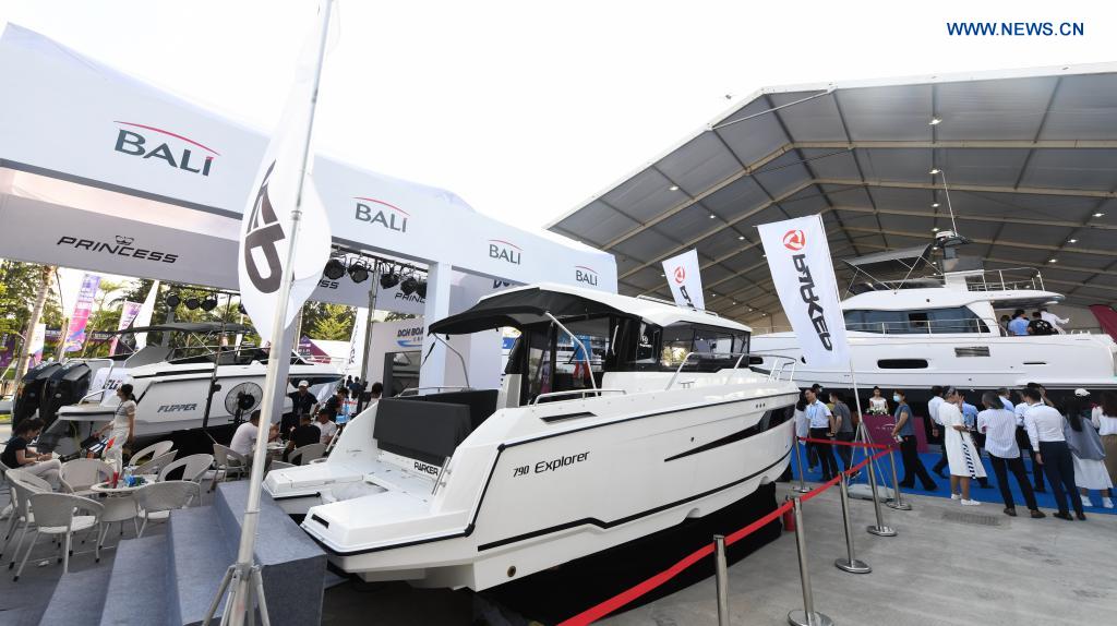 Visitors tour at a yacht show during the first China International Consumer Products Expo in Haikou, capital of south China's Hainan Province, May 7, 2021. The yacht show, part of the first China International Consumer Products Expo, opened on Friday at the Haikou National Sailing Base Public Wharf in Haikou, featuring a total of 107 yachts in 58 brands. The expo kicked off here on Thursday. (Xinhua/Yang Guanyu)